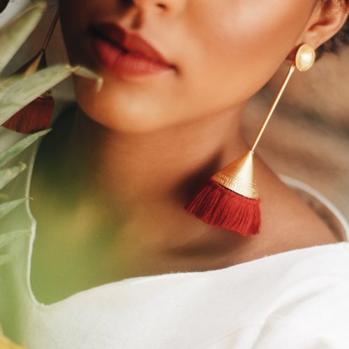 women wearing vettea earring