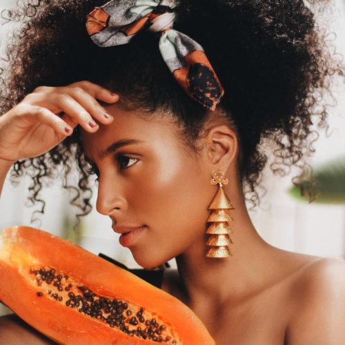 women wearing calima vettea earring