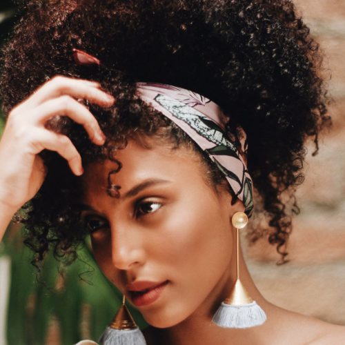 women wearing calima vettea earring
