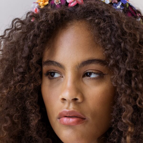The Alida Headband is made by hand in New York of hand-painted fabric