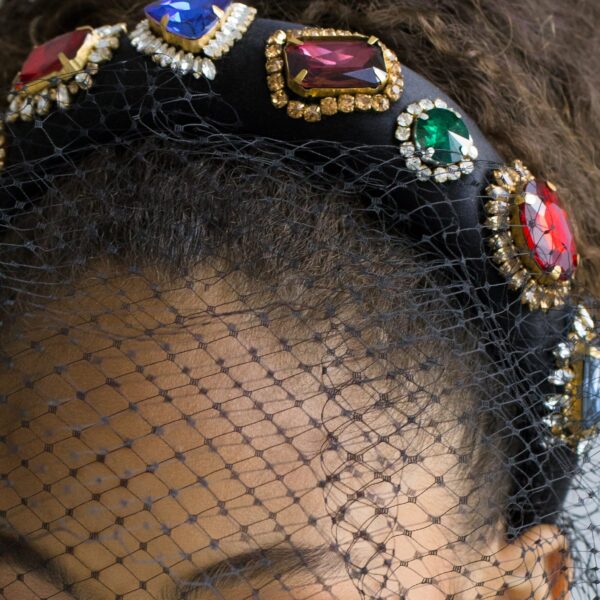 The Fernande Voilette Headband is crafted in New York from hand-embroidered crystal appliques