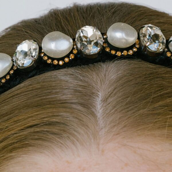 The Astor Headband is crafted in New York from hand-embroidered beads and crystals