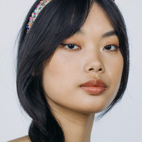 The Mira Headband is crafted in New York from hand-embroidered crystals