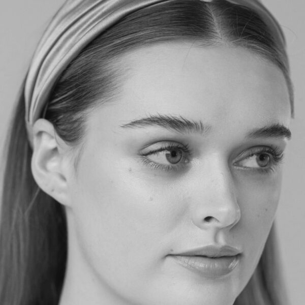 This Natasha Headband is made by hand in New York from hand draped silk on a flexible wide headband. We recommend storing headbands in their dust bag while not in use. Avoid contact with water