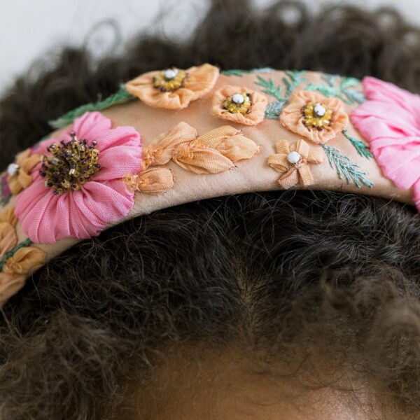 The Sheryl Headband is made by hand in New York of hand-dyed fabric and crystal embellishment