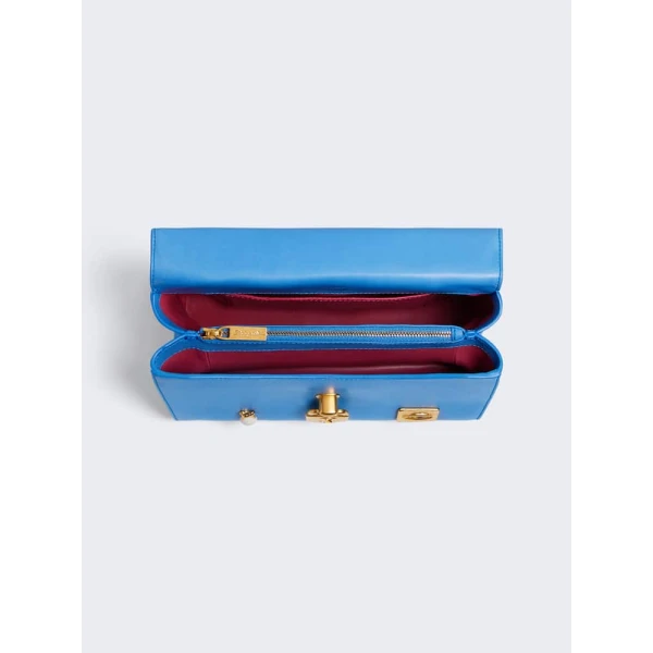 Schiaparelli nose bag