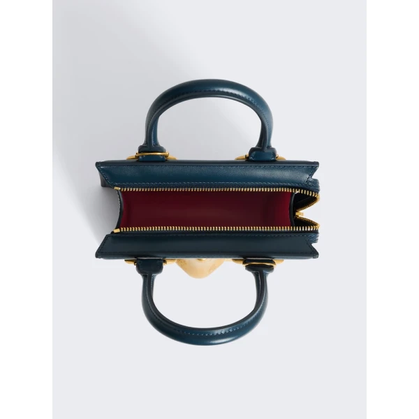 Schiaparelli Mini Anatomy Jewelry Bag in blue leather top view