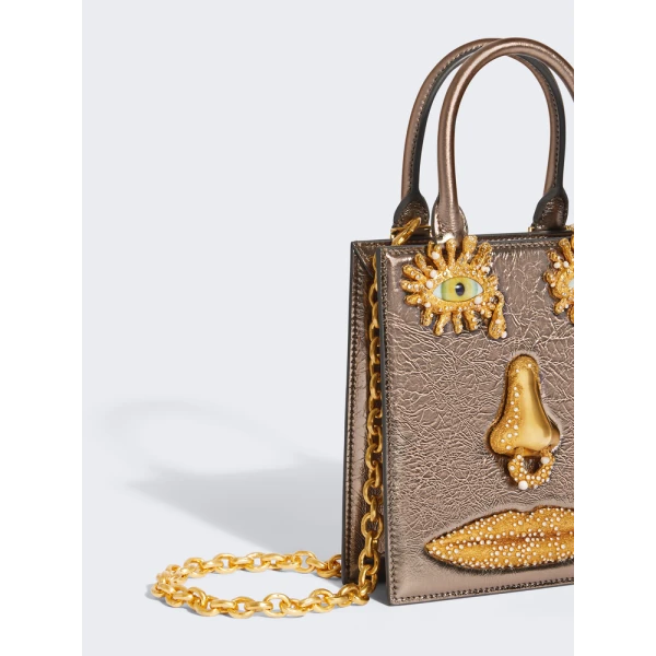 Schiaparelli nose bag