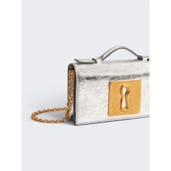 Schiaparelli Keyhole Chain Clutch luxury Bags from  Luxury Handbags Marketplace