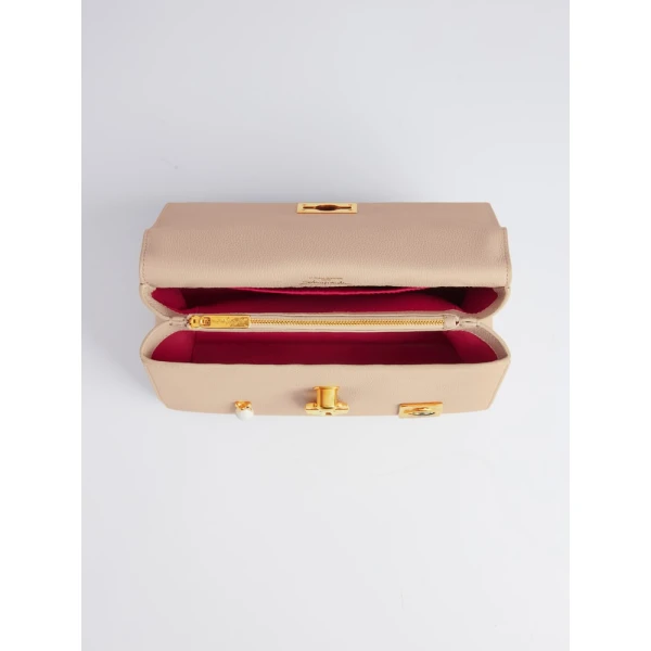 Schiaparelli nose bag