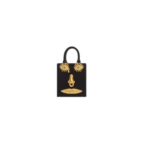 Schiaparelli Mini Anatomy Jewelry Bag in black velvet featuring gold nose and mouth hardware (Face Bag)
