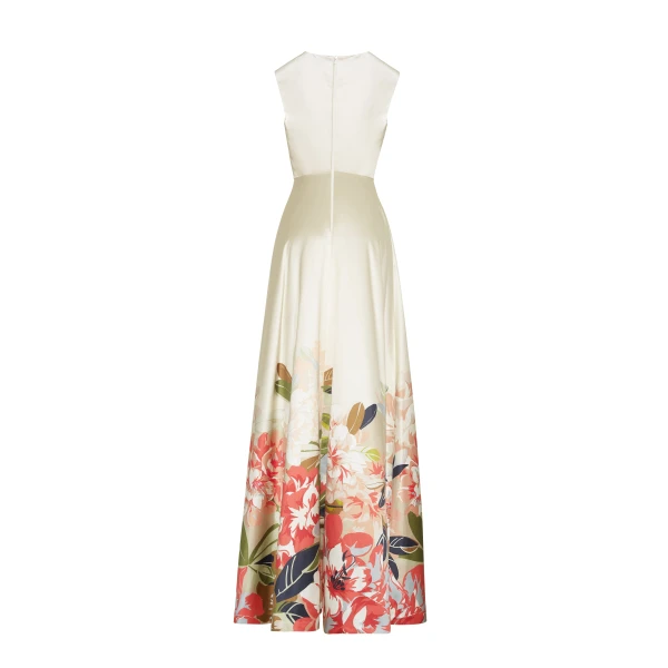 it features a classic rounded neckline and flows gracefully for effortless wear.