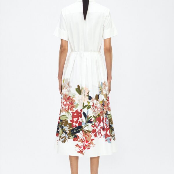 crafted from Italian cotton poplin and printed with this season’s Sicily-inspired floral motif. Featuring side pockets and diamond monogram mother of pearl buttons