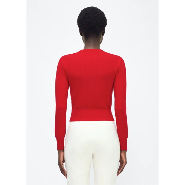 crafted in our signature compact jacquard. Designed with a fitted bodice and delicate stitching