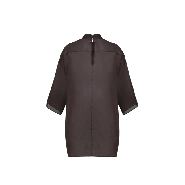the Brynn Top is crafted from airy cotton organdy in a rich ebony hue. The relaxed fit