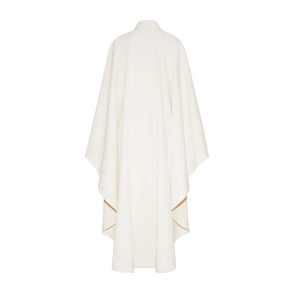 Adam Lippes P25 collection; The Langston Poncho in ivory cotton twill offers an elegant take on the classic poncho. With its modern