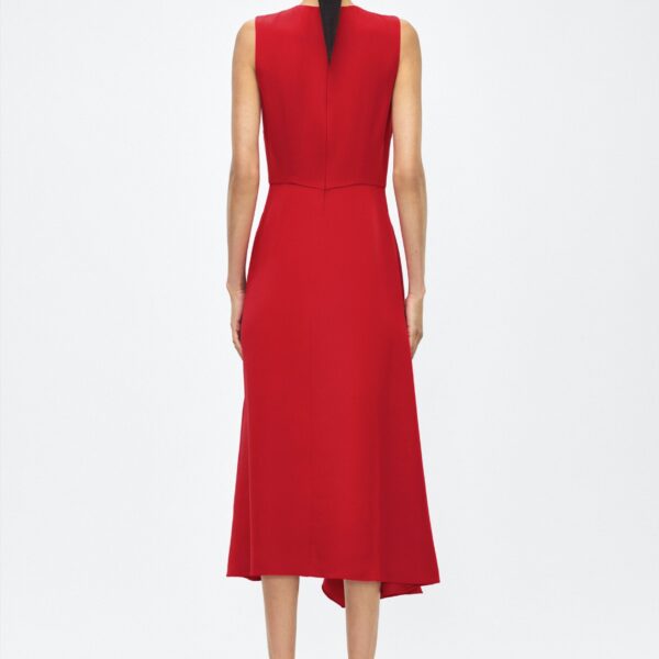 P25 collection: The Lynn Dress introduces a striking new silhouette in silk crepe. This sleeveless design features a softly contoured waistline and an asymmetric draped panel