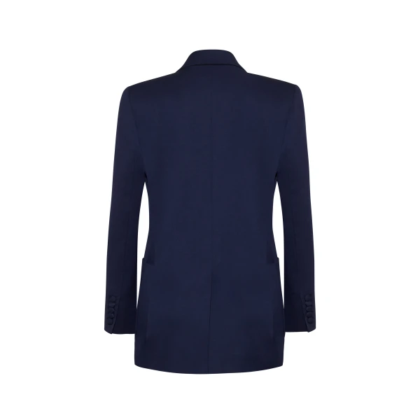resilient fabric that maintains its shape while offering ease of movement. Featuring peaked lapels and a double-breasted front