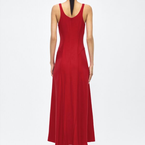 the Shay dress features a structured silhouette with a softly contoured waistline and fluid
