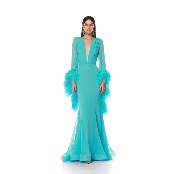 Bronx and Banco Green Geisha V-Neck Teal Gown  a harmonious blend of structured elegance and timeless sophistication.
