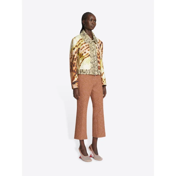 Orchid Petals all-over print and jacquard snakeskin piping.