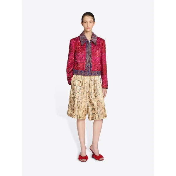 with snakeskin printed sequin embroidery.