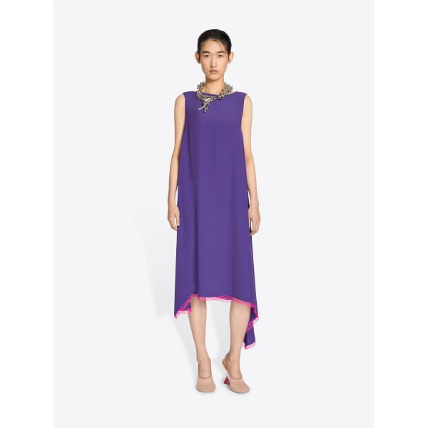 with asymmetrical hem and contrast lace trim.