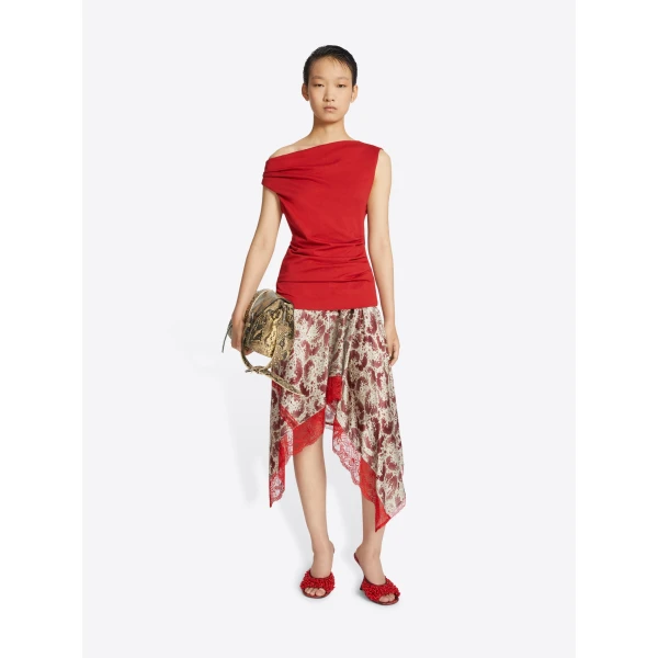 with draping and waist pleats.