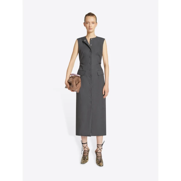 with pockets and belt at the back.