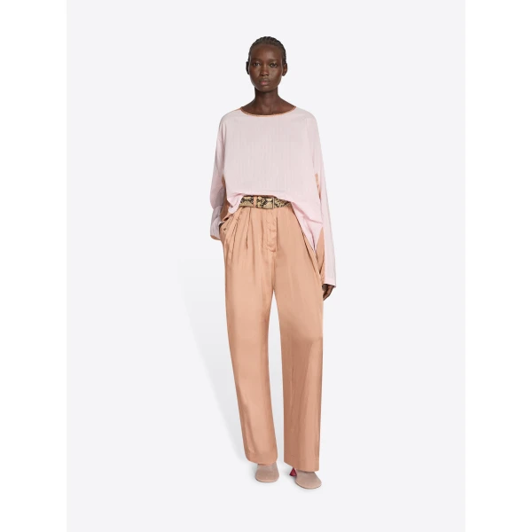 with pleats and patch pockets.