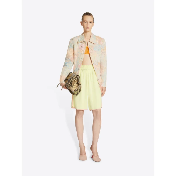 in fluid crepe satin.