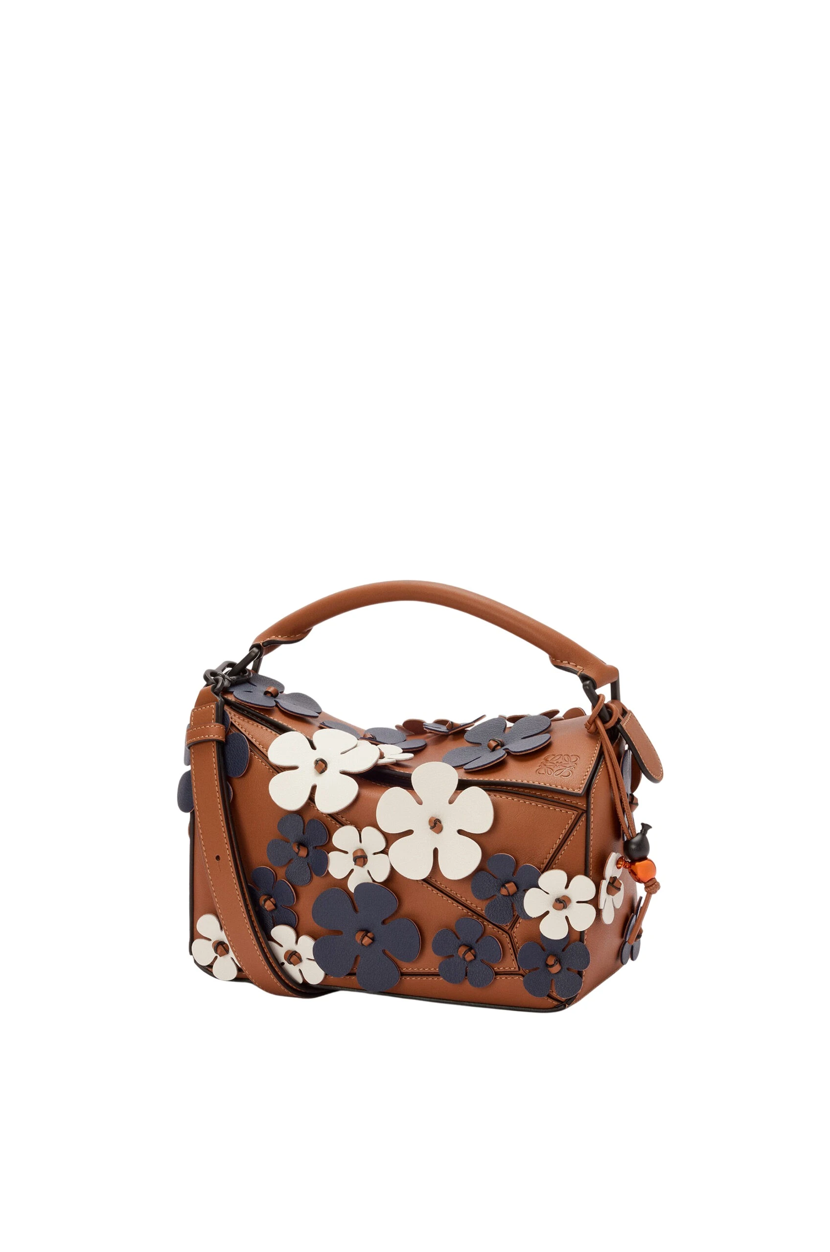 LOEWE-Puzzle-10-Plumeria-re-edition-bag-in-classic-calfskin-2025-coveti-scaled32317_nobg LOEWE Puzzle Bag luxury Bags from Luxury Handbags Marketplace