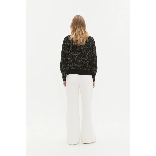 Aje clothing Aus Knitwear – structured silhouette with raw femininity from Luxury Shoes 