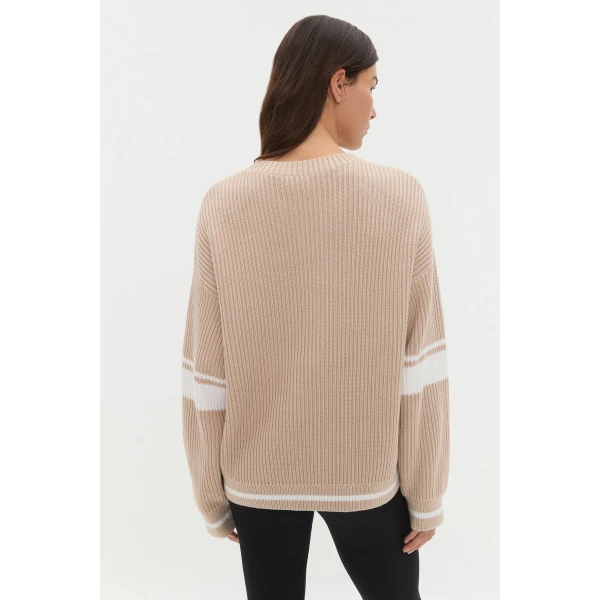 Aje Aus Knitwear – structured silhouette with raw femininity from Luxury Shoes 