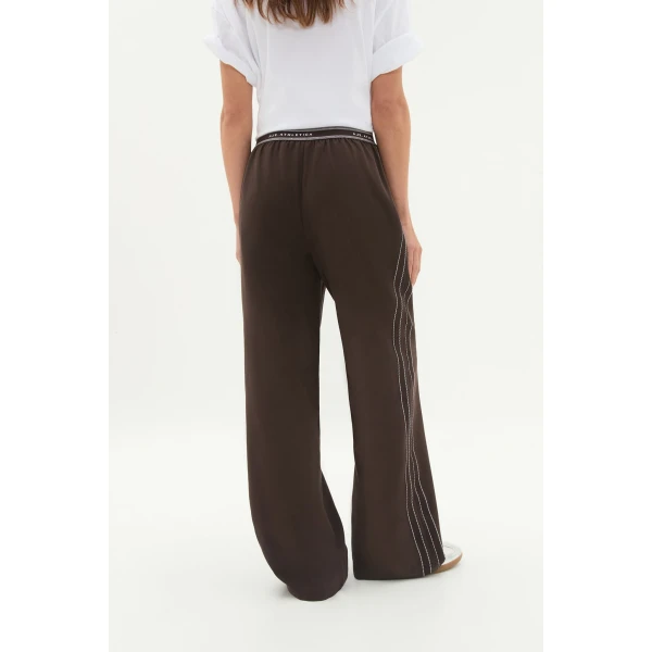 Aje Aus Pants – structured silhouette with raw femininity from Luxury Shoes 