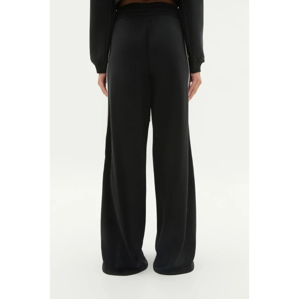 Aje Aus Pants – structured silhouette with raw femininity from Luxury Shoes 