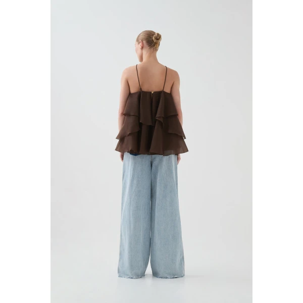 Aje Aus Tops – structured silhouette with raw femininity from Luxury Shoes 