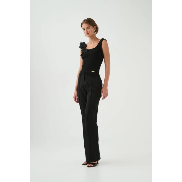 Aje Aus Tops – structured silhouette with raw femininity from Luxury Shoes 