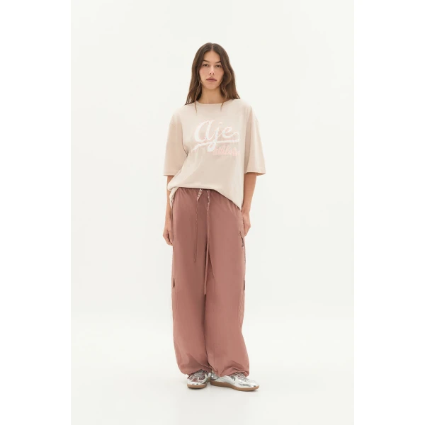 Aje clothing Aus Tops – structured silhouette with raw femininity from Luxury Shoes 