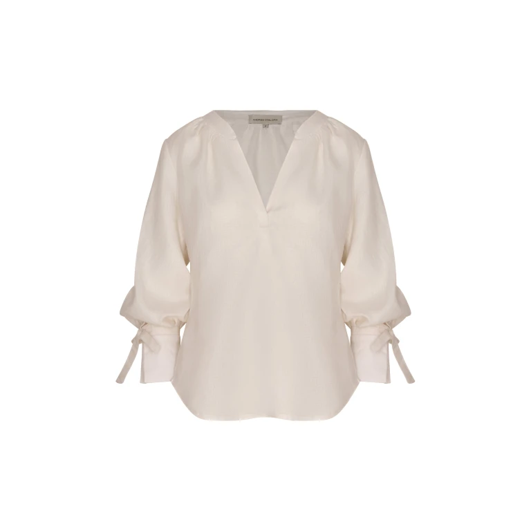 Andres Otalora luxury designer Top with bold silhouette in linen
