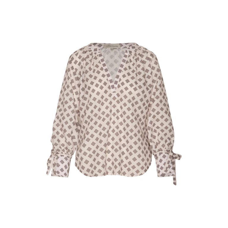 Andres Otalora luxury designer Top with bold silhouette in linen