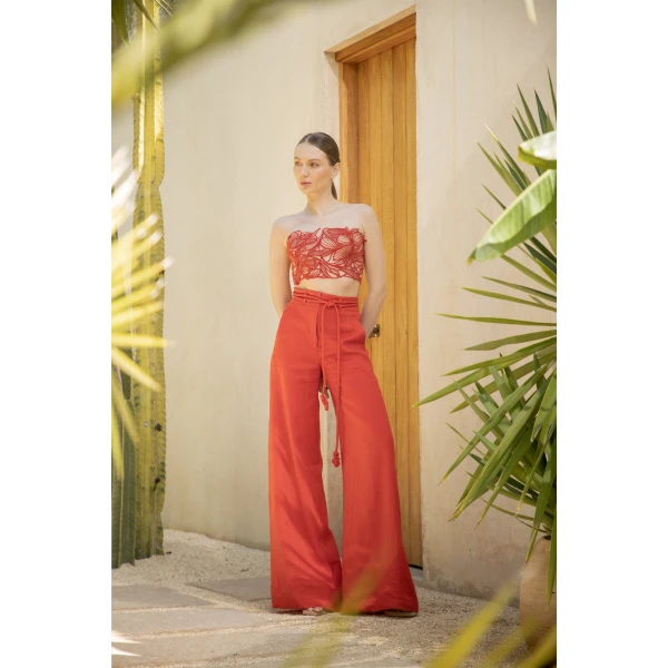 Andres Otalora luxury designer Top with bold silhouette in linen