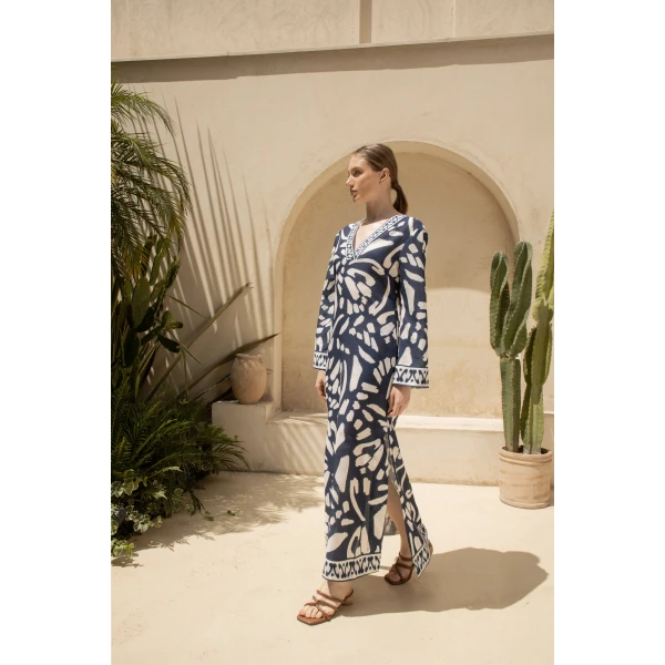 Andres Otalora luxury designer Dress with bold silhouette in linen