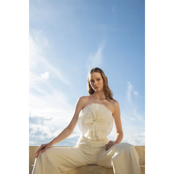 Andres Otalora luxury designer Top with bold silhouette in linen