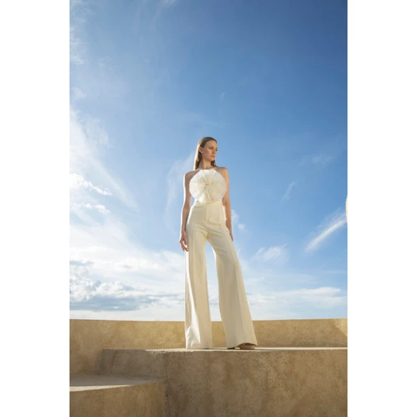 Andres Otalora luxury designer Top with bold silhouette in linen