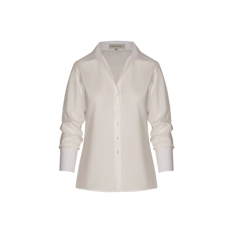 Andres Otalora luxury designer Top with bold silhouette in linen
