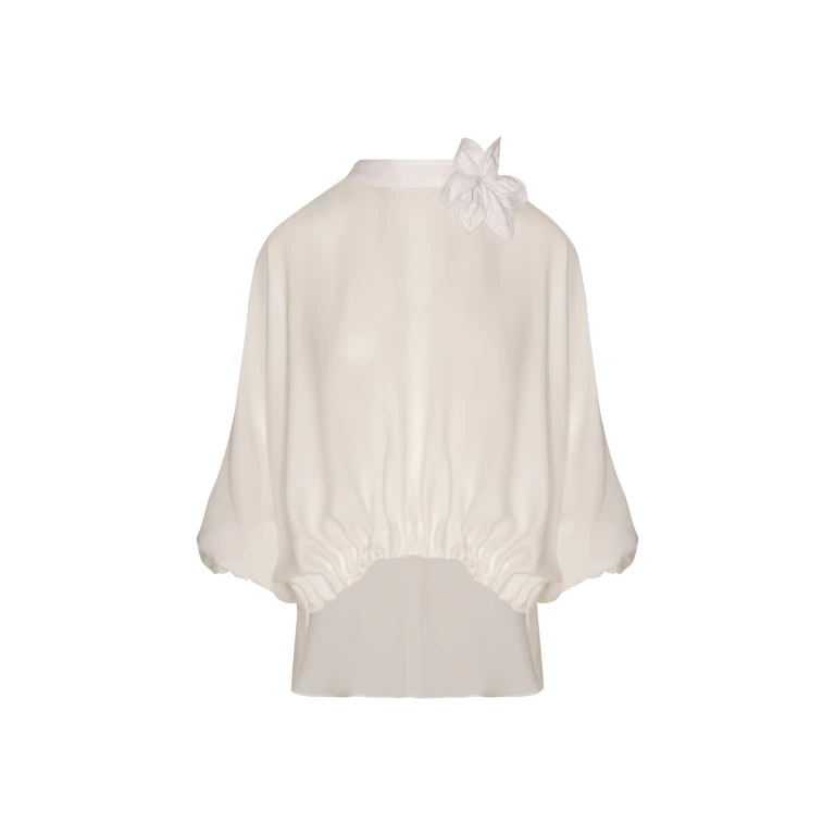 Andres Otalora luxury designer Top with bold silhouette in linen