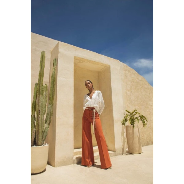 Andres Otalora luxury designer Top with bold silhouette in linen