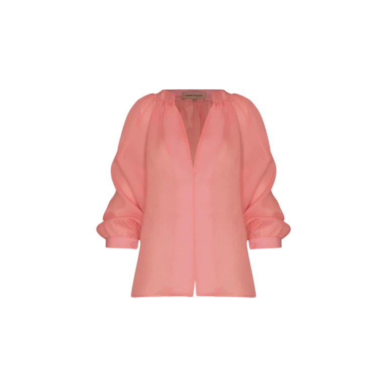 Andres Otalora luxury designer Top with bold silhouette in linen