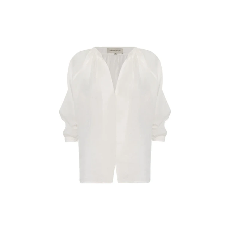Andres Otalora luxury designer Top with bold silhouette in linen